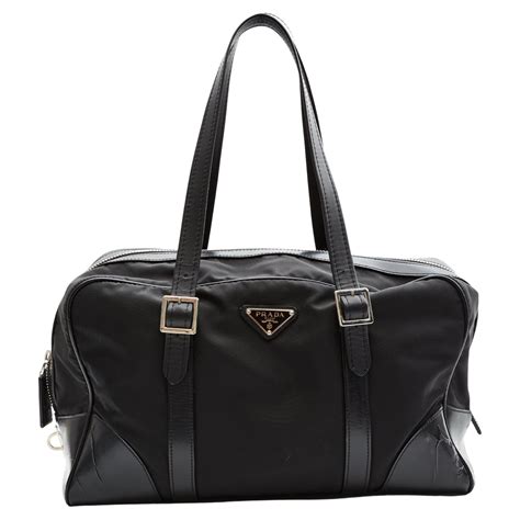 prada luggage bag|Prada overnight bag.